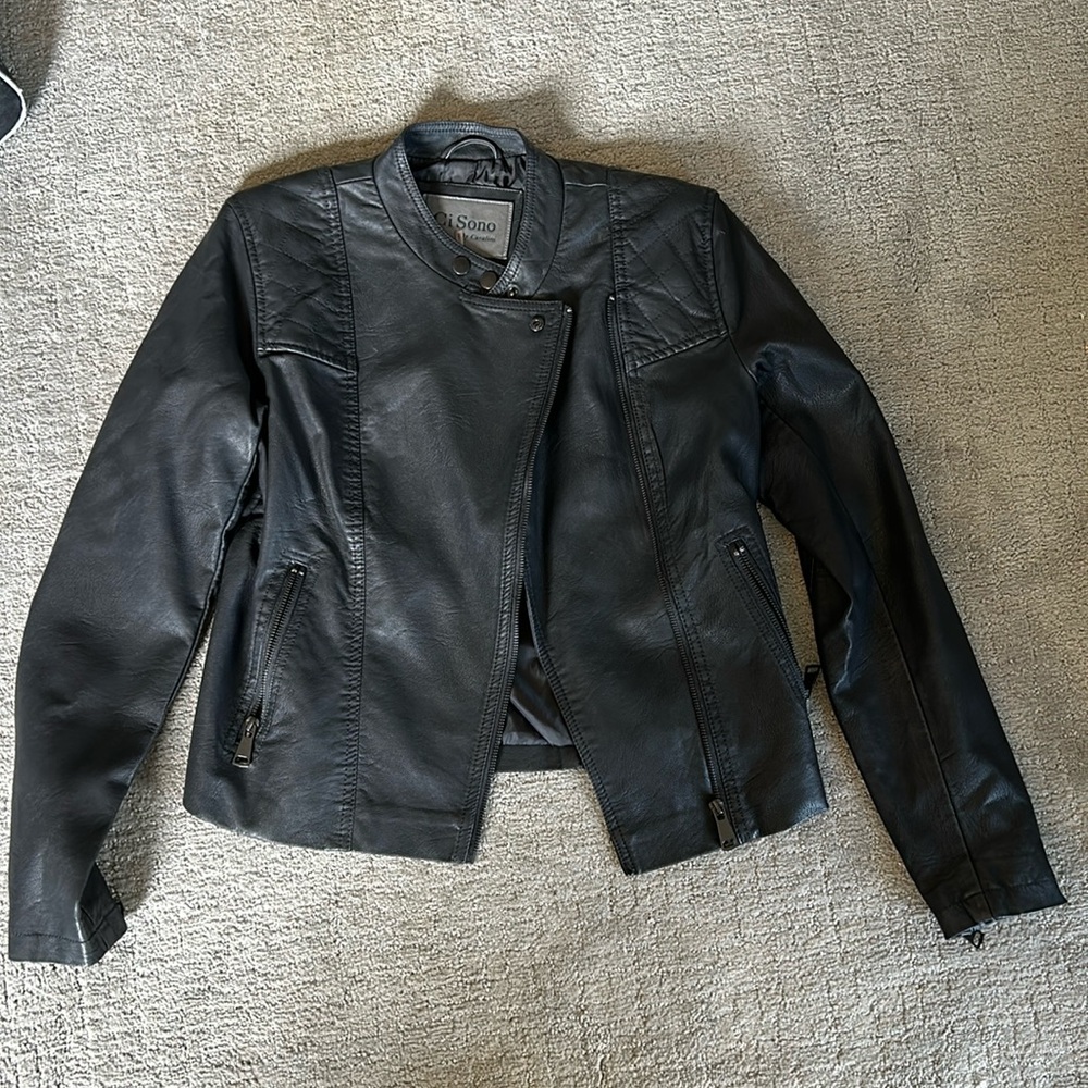 Leather Jacket. Lightweight. Short. Zippered pockets.
